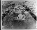 Image of Tah-ta-rah having a sun bath; without cap [Taterau]